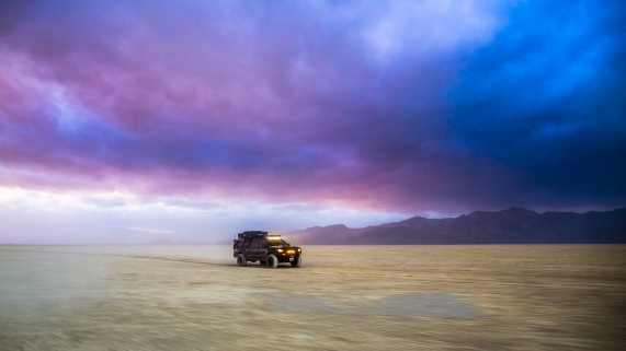 Toyota Tacoma SYTFU510 racing an incoming storm